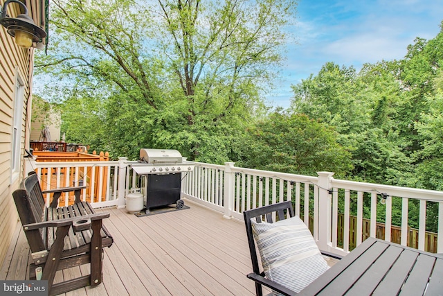 wooden deck with area for grilling