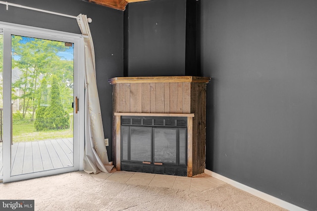28 Chatham Ct, Dover, DE 19901 - detailed view of a fireplace with flush hearth, carpet, and baseboards