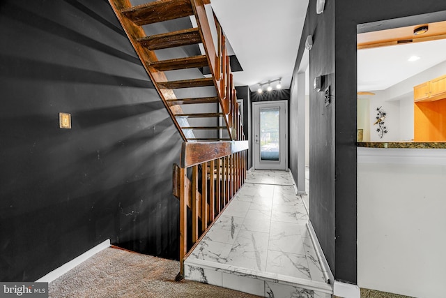 28 Chatham Ct, Dover, DE 19901 - hallway with marble look tiles, baseboards, and stairway