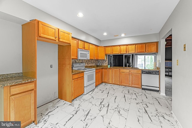 28 Chatham Ct, Dover, DE 19901 - kitchen with white appliances, recessed lighting, light marble finish flooring, light stone counters, and baseboards