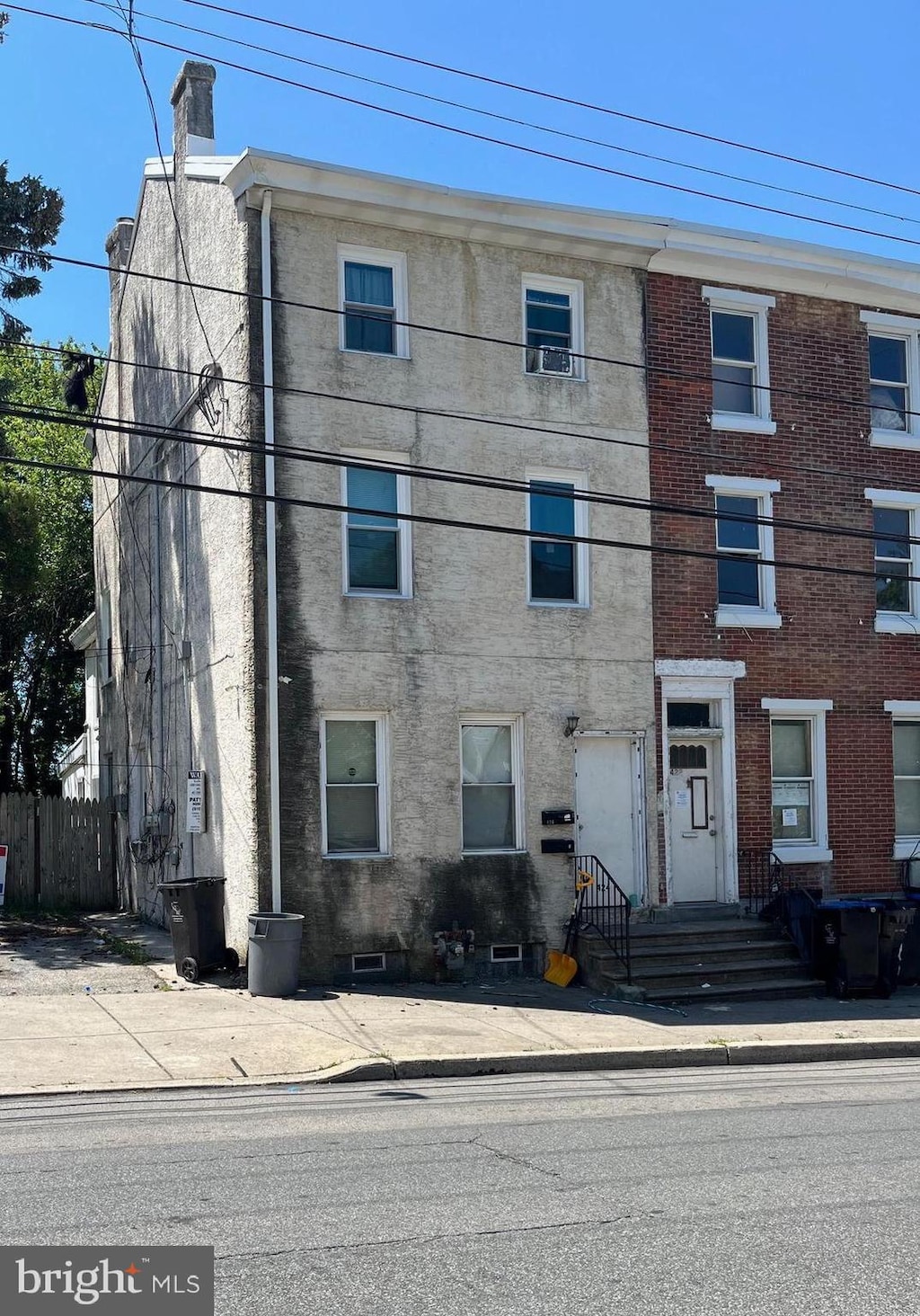 424 E Marshall St, Norristown, PA 19401 - townhome / multi-family property with a chimney