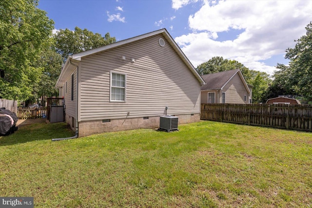 309 6th St, Colonial Beach, VA 22443 - back of property with crawl space and central AC unit