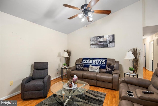 309 6th St, Colonial Beach, VA 22443 - living area featuring ceiling fan, light wood-type flooring, baseboards, and high vaulted ceiling