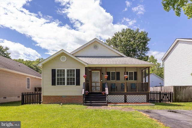 309 6th St, Colonial Beach, VA 22443 - view of front of house with crawl space, a porch, and a shingled roof