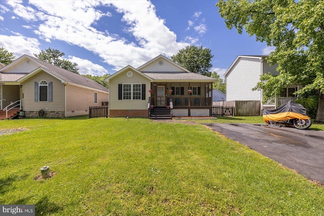 309 6th St, Colonial Beach, VA 22443 - view of front of house featuring covered porch and crawl space