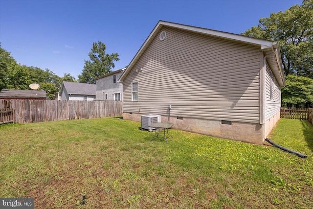 309 6th St, Colonial Beach, VA 22443 - view of home's exterior with crawl space and central AC unit