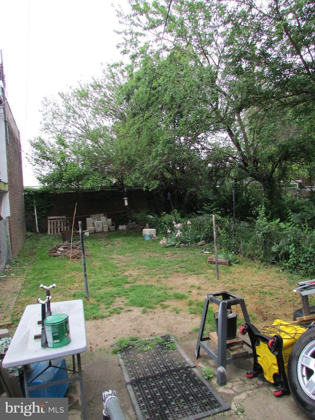 fenced backyard featuring a patio area
