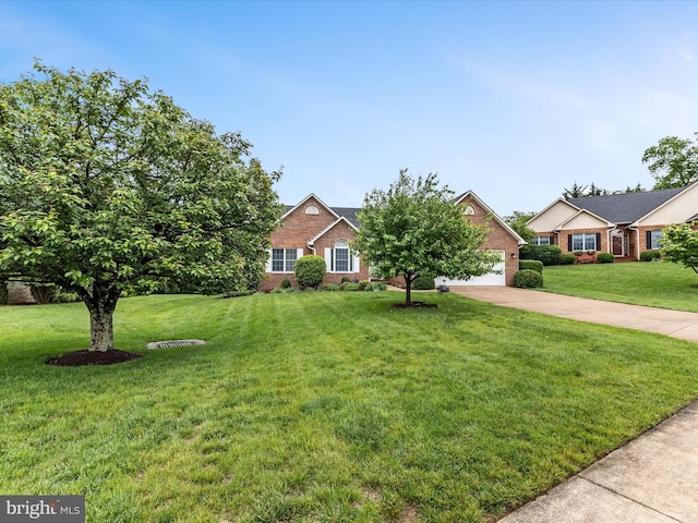 1412 Magruder Ct, Winchester, VA 22601 - view of front of property featuring brick siding, driveway, a front lawn, and a garage