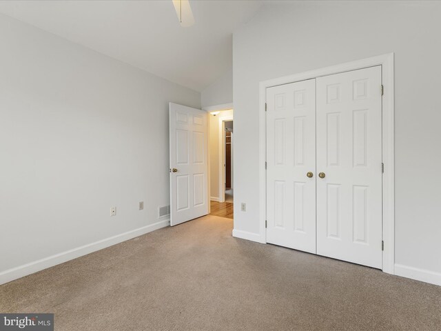 1412 Magruder Ct, Winchester, VA 22601 - unfurnished bedroom with carpet flooring, vaulted ceiling, baseboards, a closet, and a ceiling fan