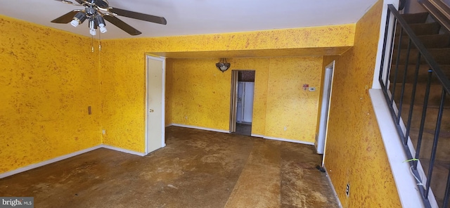 9422 Windpine Rd Unit 9422, Baltimore, MD 21220 - empty room with ceiling fan, concrete flooring, and stairs