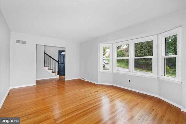 2518 Reynolds Ave, Claymont, DE 19703 - spare room featuring light wood-style floors, stairs, and baseboards