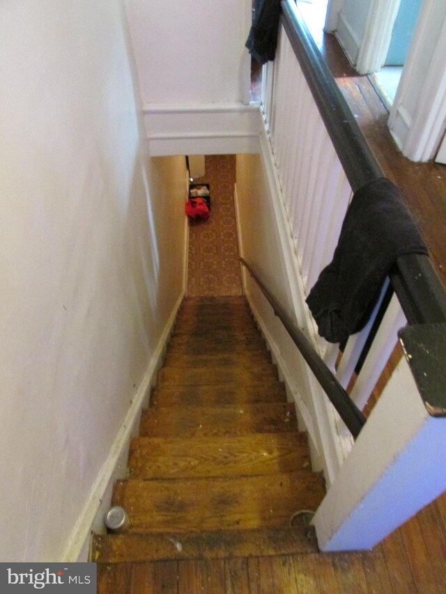 524 W Tabor Rd, Philadelphia, PA 19120 - stairs with wood-type flooring and baseboards