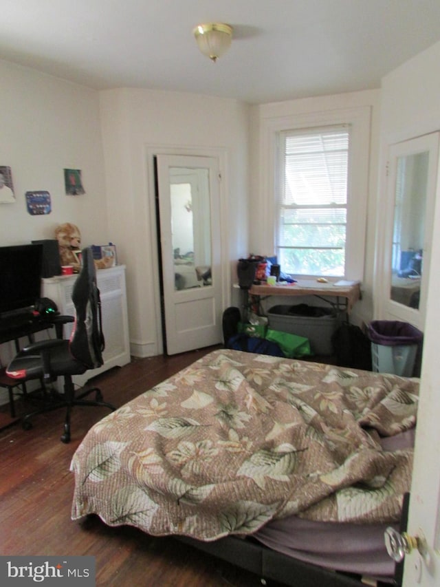 524 W Tabor Rd, Philadelphia, PA 19120 - bedroom featuring wood finished floors and a desk