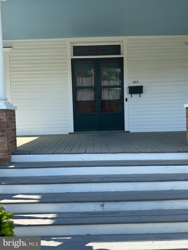 doorway to property featuring french doors