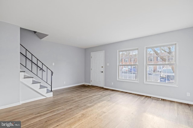 312 E Cornell Dr, Sterling, VA 20164 - entryway with wood finished floors, baseboards, and stairway
