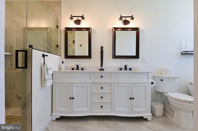 bathroom featuring a stall shower, toilet, double vanity, and marble look tile flooring
