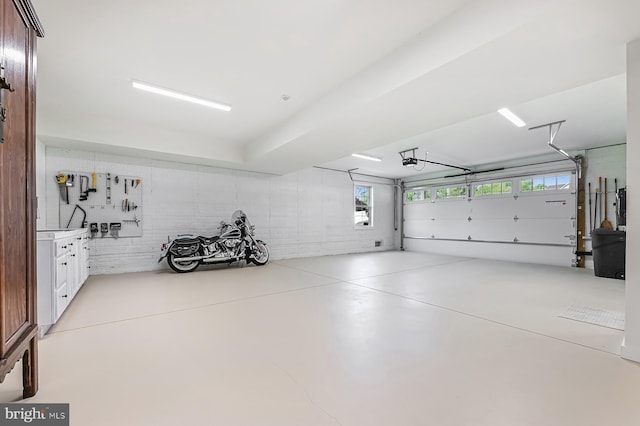 garage featuring a garage door opener