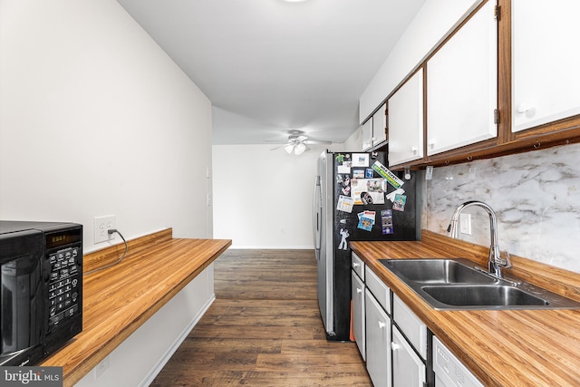 210 Trimper Ave Unit 8, Ocean City, MD 21842 - kitchen featuring a sink, butcher block countertops, decorative backsplash, and dark wood-style floors