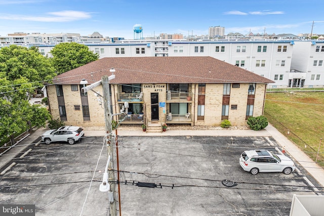 210 Trimper Ave Unit 8, Ocean City, MD 21842 - view of building exterior with uncovered parking