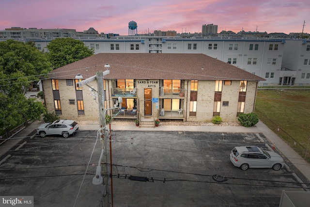 210 Trimper Ave Unit 8, Ocean City, MD 21842 - property at dusk featuring uncovered parking