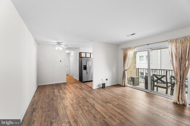 210 Trimper Ave Unit 8, Ocean City, MD 21842 - empty room featuring baseboards, dark wood-style flooring, and a ceiling fan