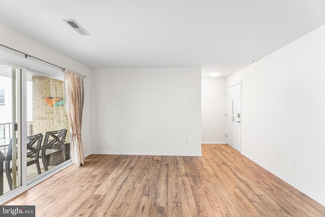 210 Trimper Ave Unit 8, Ocean City, MD 21842 - spare room featuring wood finished floors and baseboards