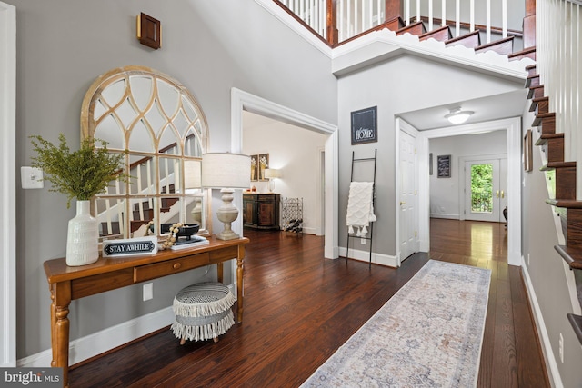 94 Tomahawk Way, Linden, VA 22642 - foyer entrance featuring wood finished floors, a high ceiling, baseboards, and stairs