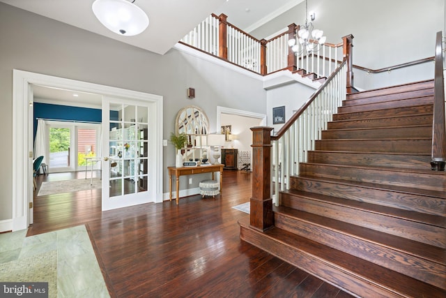 94 Tomahawk Way, Linden, VA 22642 - staircase with french doors, wood finished floors, a chandelier, and baseboards