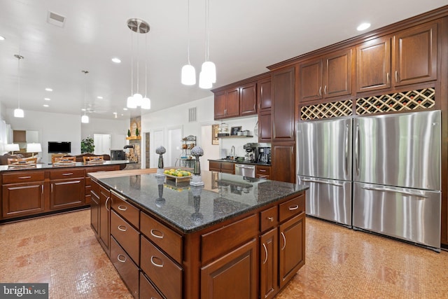 94 Tomahawk Way, Linden, VA 22642 - kitchen featuring appliances with stainless steel finishes, open floor plan, a sink, a kitchen island, and pendant lighting
