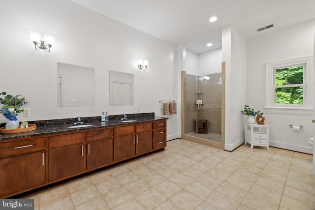 94 Tomahawk Way, Linden, VA 22642 - bathroom featuring double vanity, a stall shower, baseboards, toilet, and recessed lighting