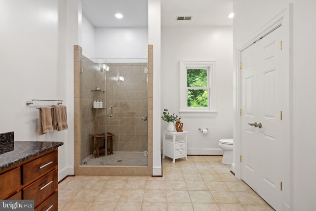 94 Tomahawk Way, Linden, VA 22642 - full bath featuring a shower stall, toilet, vanity, baseboards, and tile patterned floors