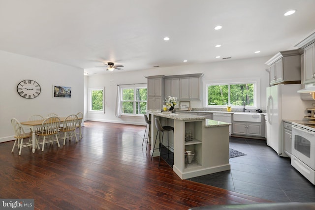94 Tomahawk Way, Linden, VA 22642 - kitchen with gray cabinets, white electric range, a kitchen island, open shelves, and recessed lighting