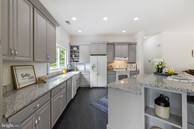 94 Tomahawk Way, Linden, VA 22642 - kitchen featuring white appliances, open shelves, gray cabinets, under cabinet range hood, and light stone countertops