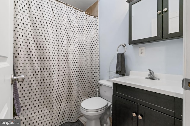 bathroom with vanity, toilet, and a shower with curtain