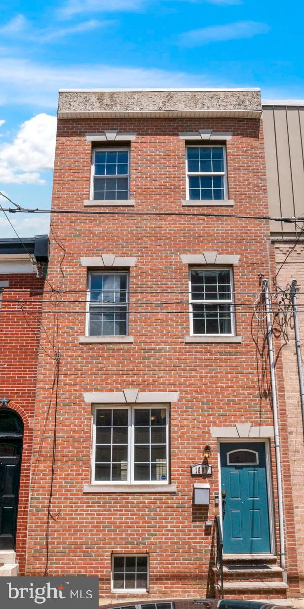 view of building exterior featuring entry steps