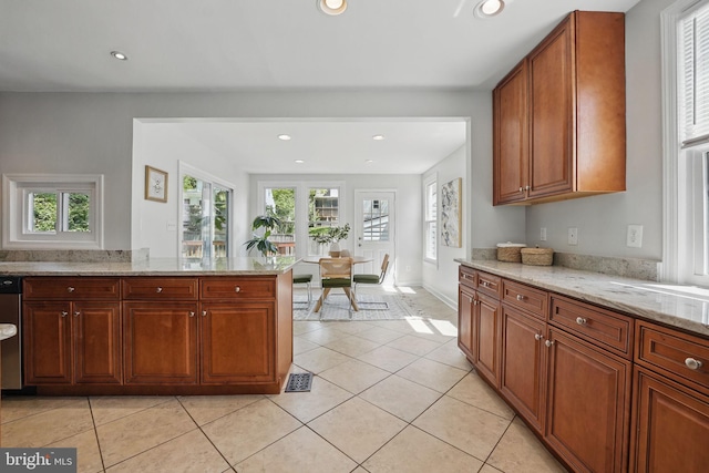 6924 Jefferson Ave, Falls Church, VA 22042 - kitchen with healthy amount of natural light, light stone counters, recessed lighting, and light tile patterned floors