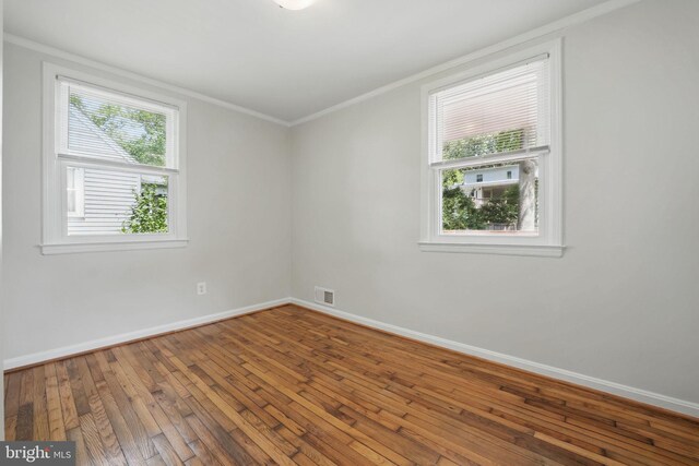 6924 Jefferson Ave, Falls Church, VA 22042 - spare room with ornamental molding, baseboards, and wood-type flooring