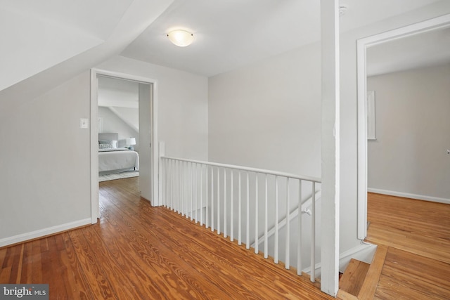 6924 Jefferson Ave, Falls Church, VA 22042 - hallway with wood finished floors, an upstairs landing, and baseboards