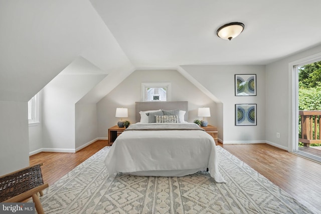 6924 Jefferson Ave, Falls Church, VA 22042 - bedroom with wood finished floors, access to outside, baseboards, and lofted ceiling