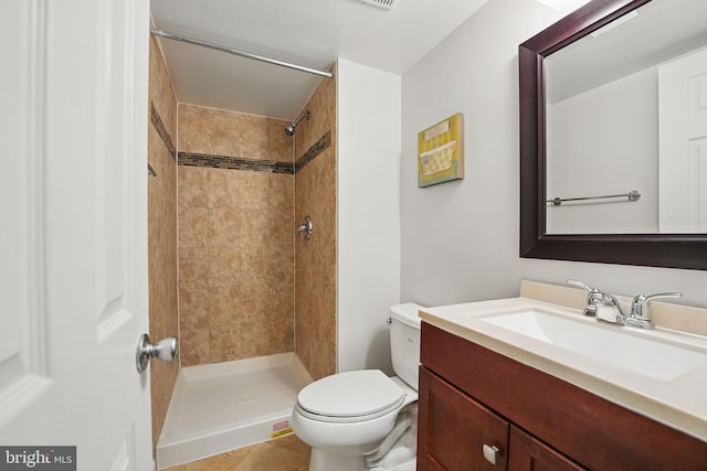 6924 Jefferson Ave, Falls Church, VA 22042 - bathroom with toilet, tiled shower, vanity, and tile patterned floors