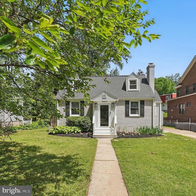 6924 Jefferson Ave, Falls Church, VA 22042 - new england style home featuring brick siding, a chimney, and a shingled roof