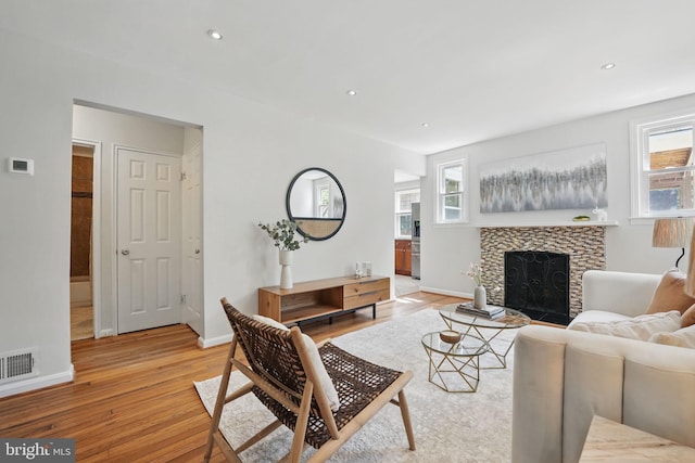 6924 Jefferson Ave, Falls Church, VA 22042 - living room with light wood-type flooring, a tile fireplace, baseboards, and recessed lighting
