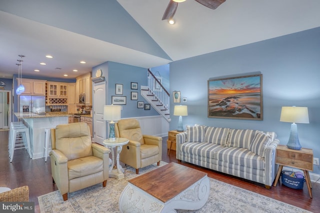 20785 Rodney Dr, Rehoboth Beach, DE 19971 - living room featuring stairs, wood finished floors, recessed lighting, vaulted ceiling, and a ceiling fan