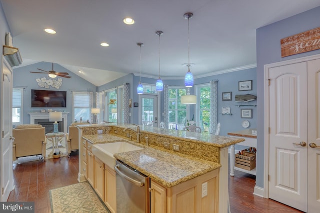 20785 Rodney Dr, Rehoboth Beach, DE 19971 - kitchen featuring stainless steel dishwasher, a sink, a ceiling fan, light brown cabinetry, and open floor plan