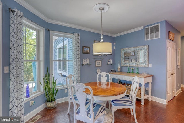 20785 Rodney Dr, Rehoboth Beach, DE 19971 - dining room with baseboards, wood finished floors, and crown molding