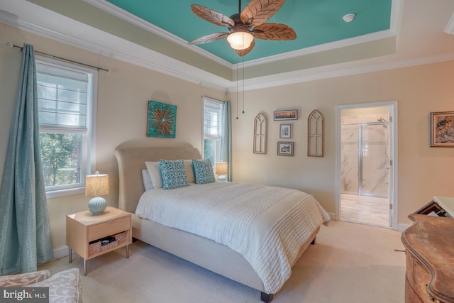 20785 Rodney Dr, Rehoboth Beach, DE 19971 - carpeted bedroom with crown molding, baseboards, ensuite bathroom, and a tray ceiling