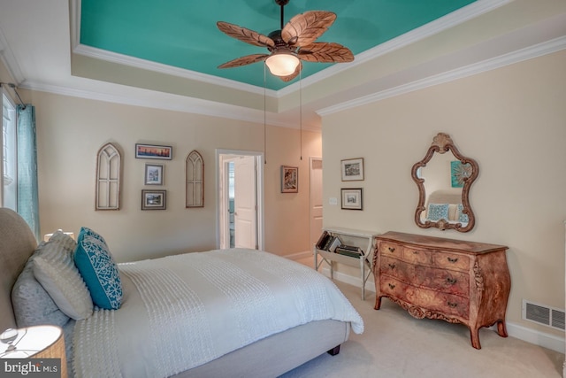 20785 Rodney Dr, Rehoboth Beach, DE 19971 - bedroom with ornamental molding, a raised ceiling, carpet flooring, ceiling fan, and baseboards
