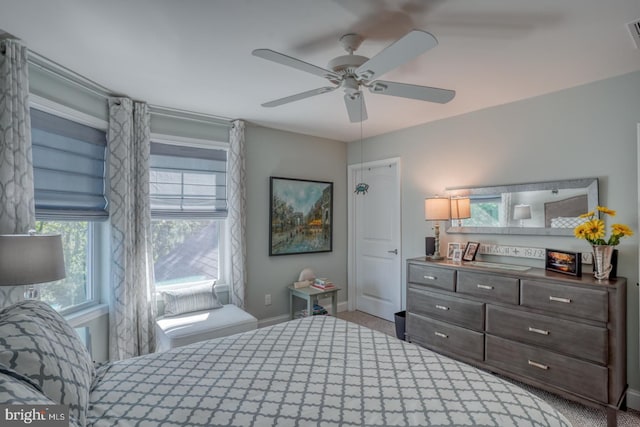 20785 Rodney Dr, Rehoboth Beach, DE 19971 - carpeted bedroom with baseboards and ceiling fan