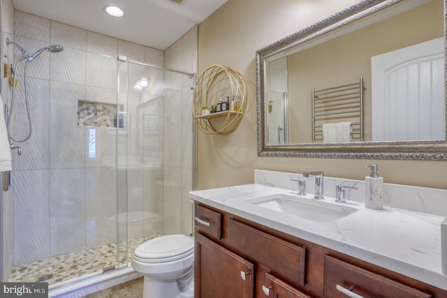 20785 Rodney Dr, Rehoboth Beach, DE 19971 - full bathroom with radiator heating unit, toilet, a stall shower, vanity, and recessed lighting