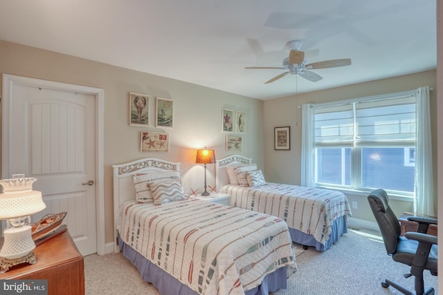 20785 Rodney Dr, Rehoboth Beach, DE 19971 - bedroom with light colored carpet, baseboards, and ceiling fan